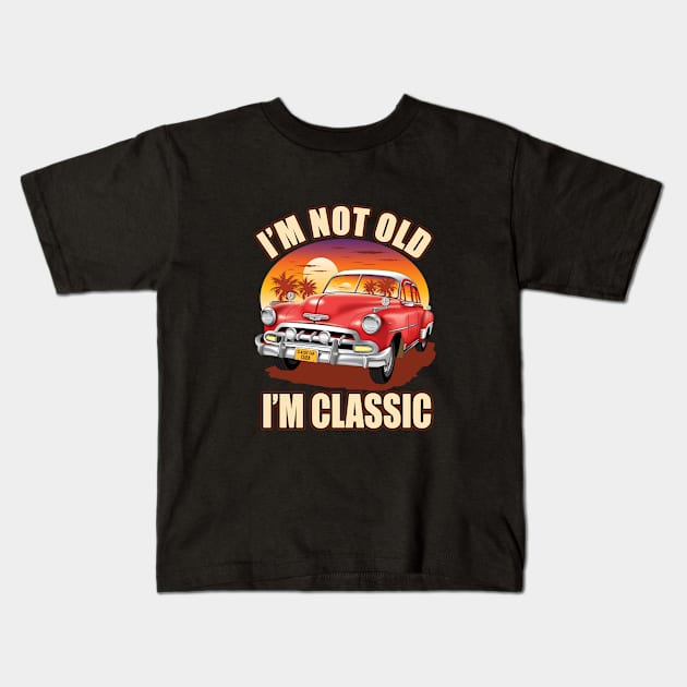 I,m not old I,m classic red classic car on the beach Kids T-Shirt by Settha.sk